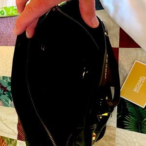 Michael Kors black handbag with detachable shoulder strap. Excellent condition.